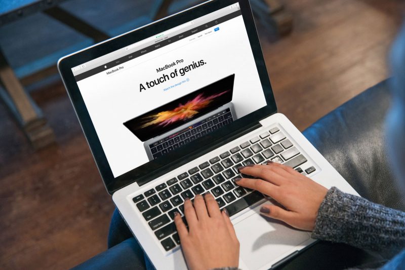 Woman Typing Code on Macbook Pro Mockup
