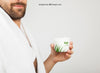 Young Man Posing With Aloe Vera Cosmetic Product Psd