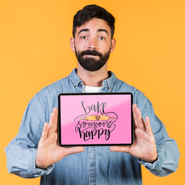 Young Man Showing A Tablet Mock Up Psd