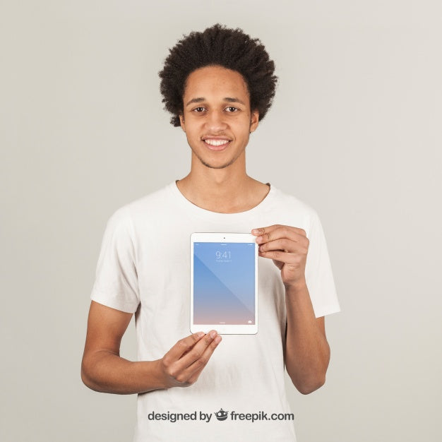 Young Man Showing Tablet Psd