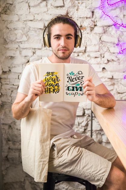 Young Man With A Open Book Mockup Psd