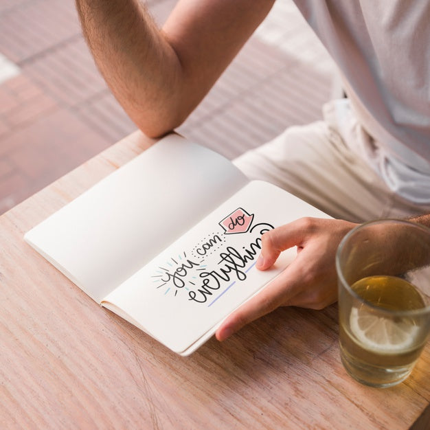 Young Man With A Open Book Mockup Psd