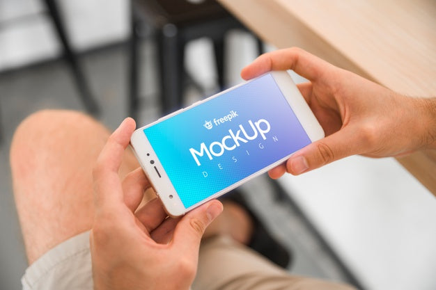 Young Man With A Smartphone Mockup Psd