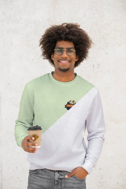Young Man With Hoodie Drinking Coffee Psd