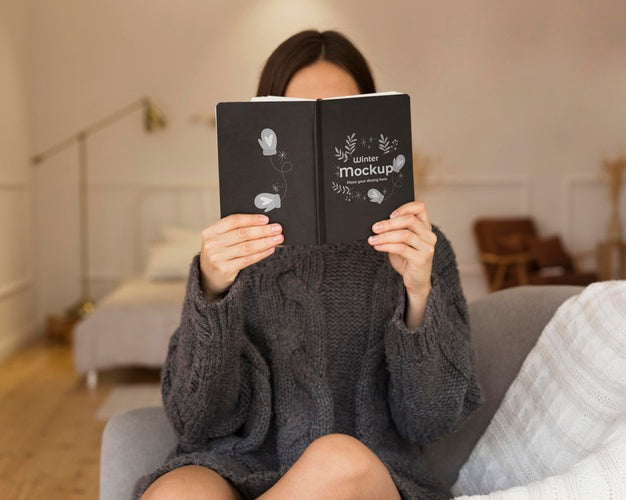 Young Woman Holding A Book Mock-Up Psd