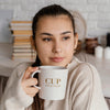 Young Woman Holding A Mock-Up Cup Psd