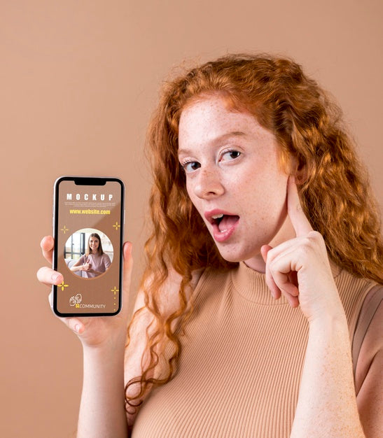 Young Woman Holding A Smartphone Mock-Up Psd