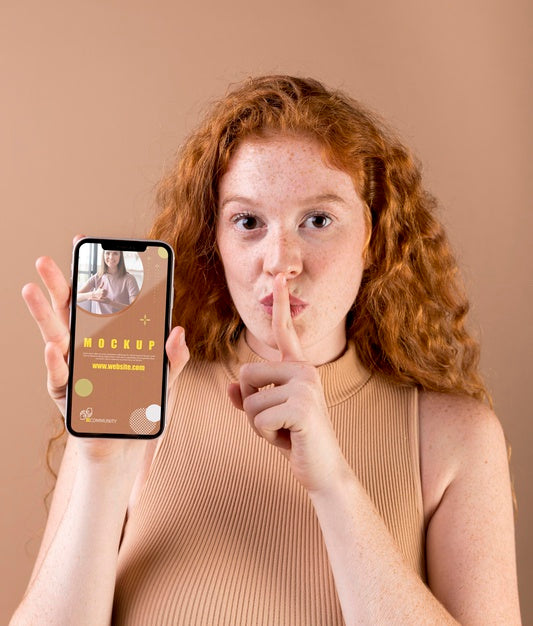 Young Woman Holding A Smartphone Mock-Up Psd