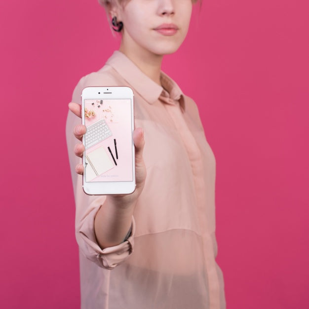 Young Woman Holding Smartphone Mockup Psd