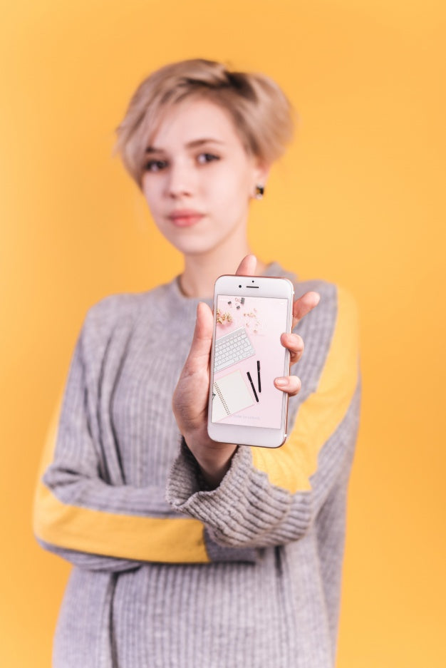 Young Woman Holding Smartphone Mockup Psd