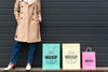 Young Woman Standing Next To Shopping Bags Mock-Up Psd
