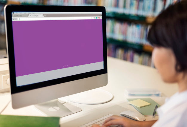 Young Woman Using A Computer With An Webpage Psd