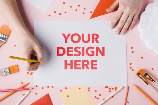 Your Design Here With Paint Brushes And Hands Psd